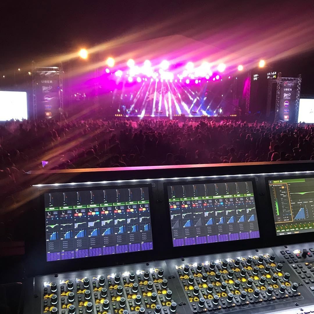 Tom Fabjance at the mixing console during a large outdoor festival