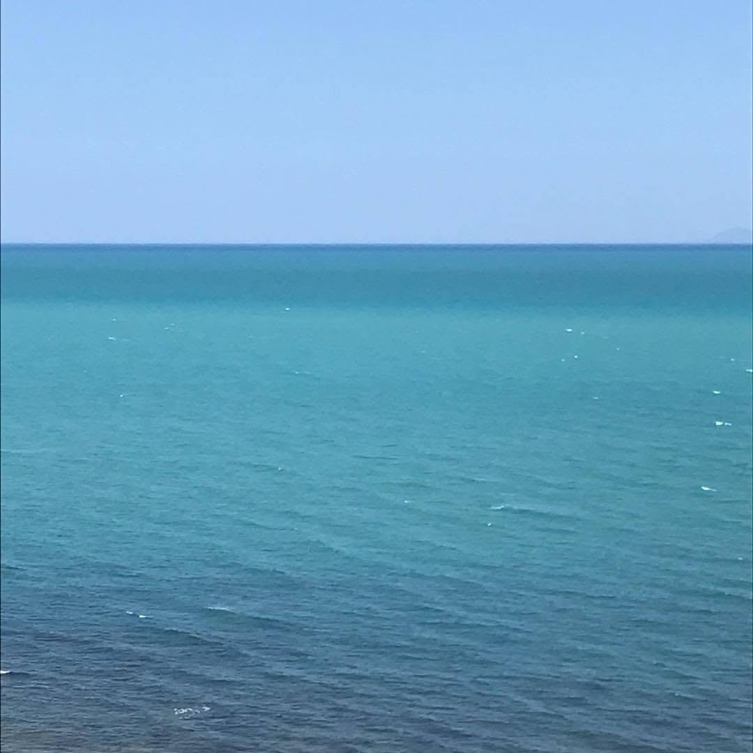 Turquoise open water stretching to the horizon
