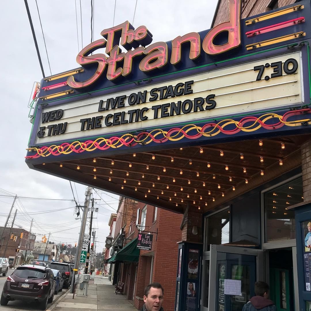 The Strand Theatre marquee lit up for The Celtic Tenors